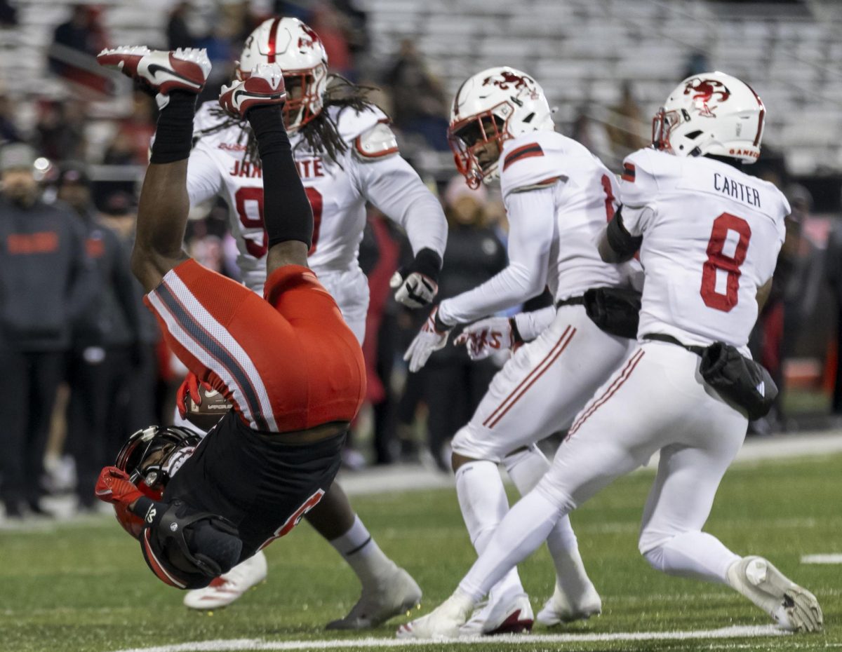 Western Kentucky Hilltoppers running back Elijah Young (3) takes a dive over the Jax State defense during WKU’s game against Jacksonville State University in Bowing Green, Ky. on Saturday, Nov. 30, 2024. 