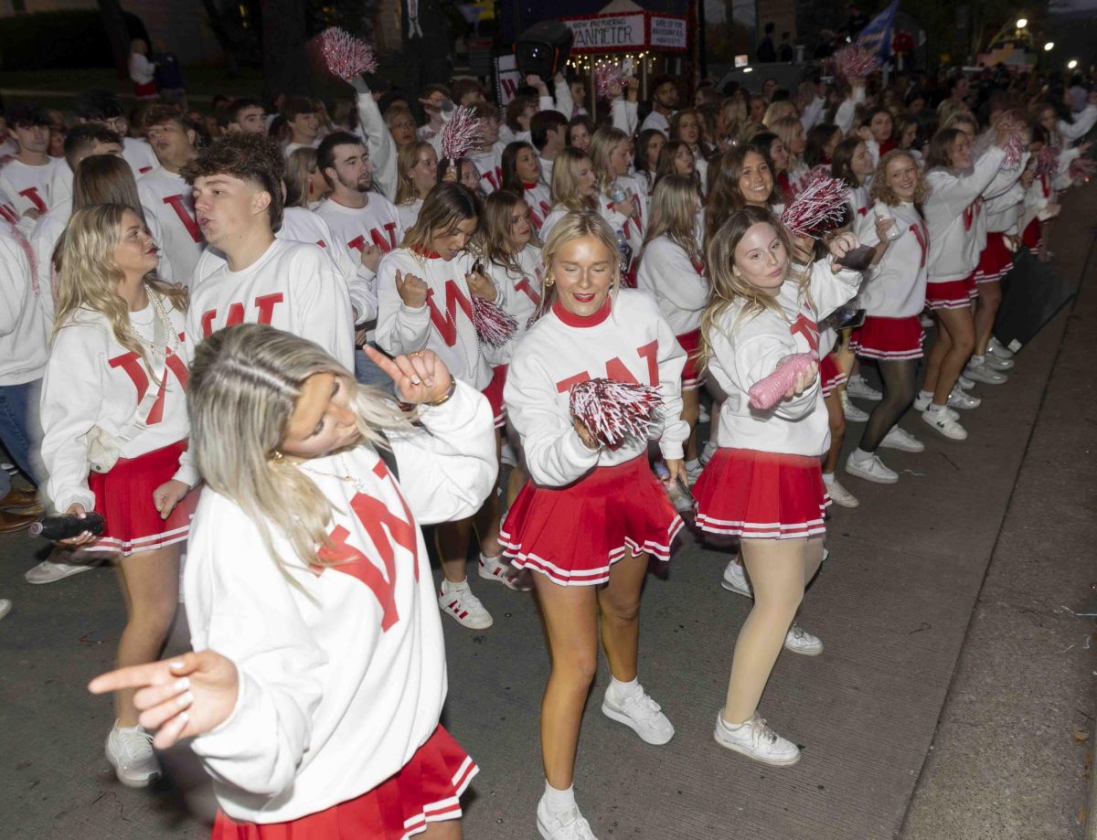 Members of Alpha Delta Pi dance before the 2024 WKU Homecoming parade on Friday, Nov. 15, 2024.