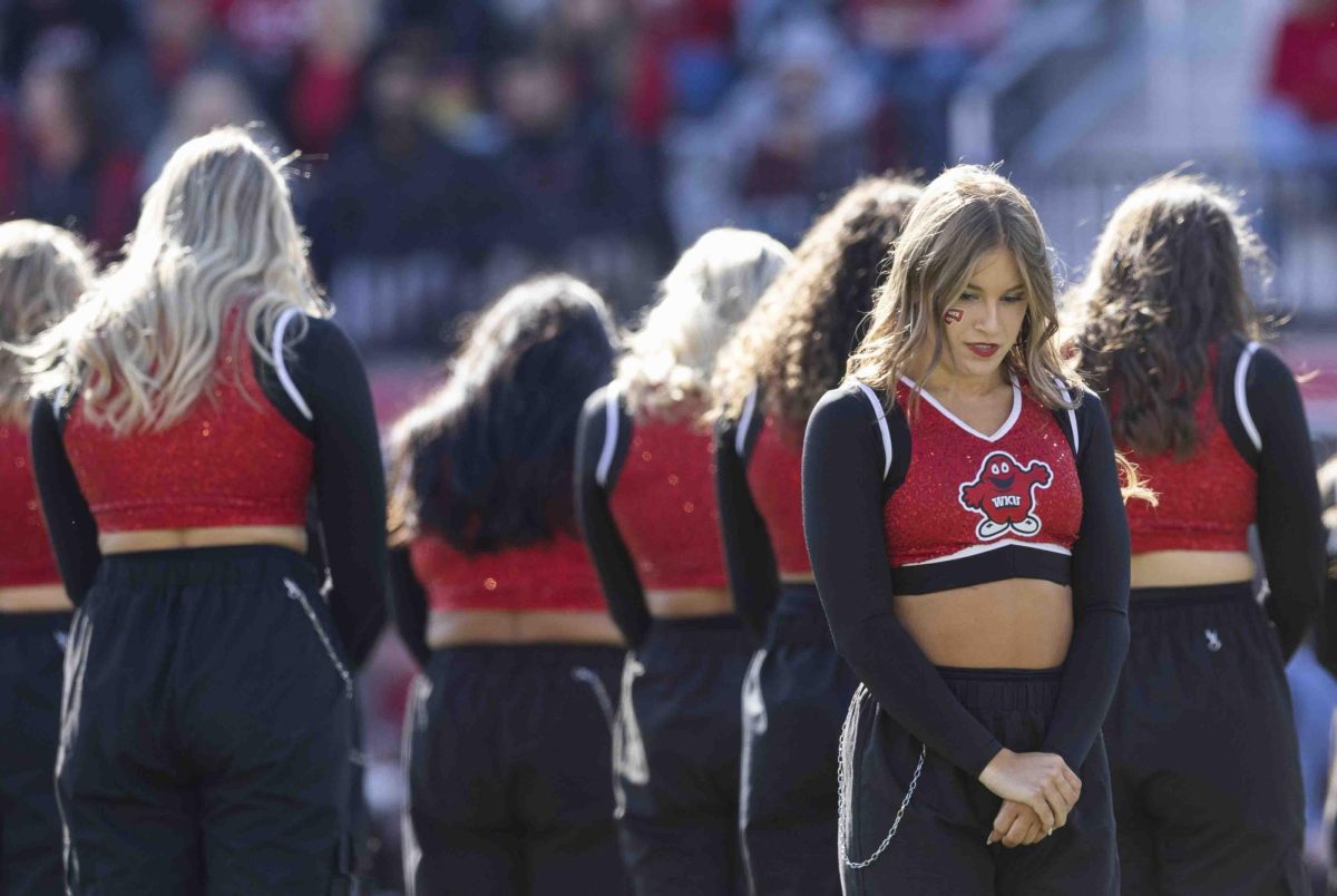 A WKU dance team member prepares to start her dance routine during the Homecoming football game in the L.T. Smith Stadium on Saturday, Nov. 16, 2024. 