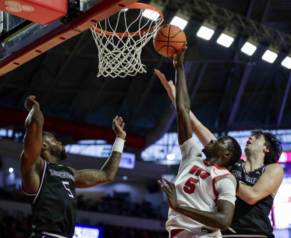 WKU forward Babacar Faye (5) lays up the ball during the game in Diddle Arena on Sunday, Nov. 17, 2024. 