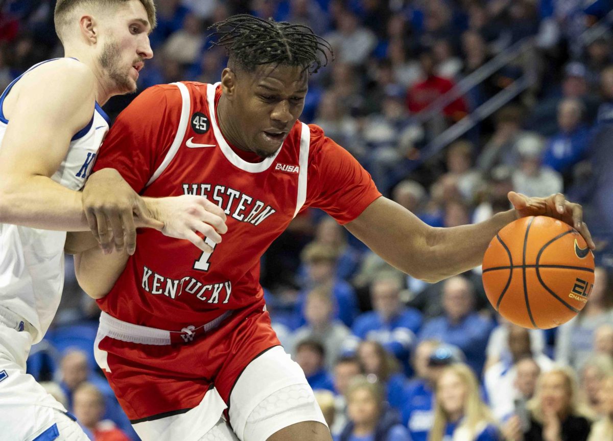 WKU forward Blaise Keita (1) drives the baseline during the basketball game against University of Kentucky in Rupp Arena in Lexington, Ky., on Tuesday, Nov. 26, 2024. 