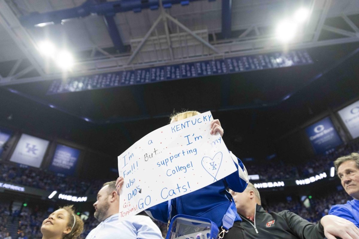 Kennedy Kerkhoff, 9, cheers for both WKU and UK during the basketball game against in Rupp Arena in Lexington, Ky., on Tuesday, Nov. 26, 2024. 