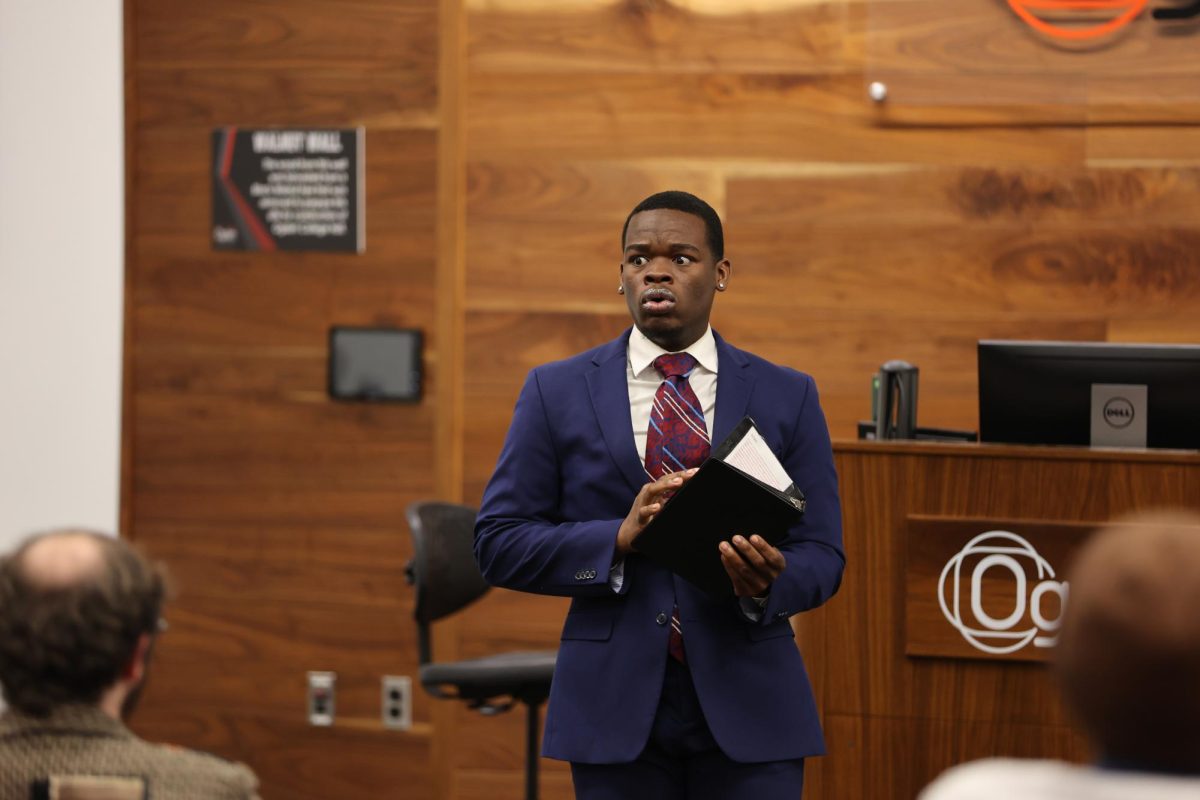 Aquilla Dunn performs his speech during the WKU Forensics Speech and Debate Showcase hosted on Thursday, Nov. 21, 2024.