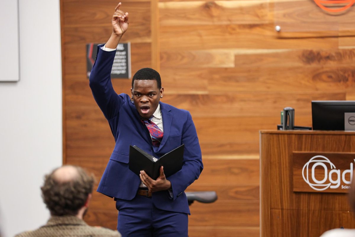 Aquilla Dunn performs his speech during the WKU Forensics Speech and Debate Showcase hosted on Thursday, Nov. 21, 2024.