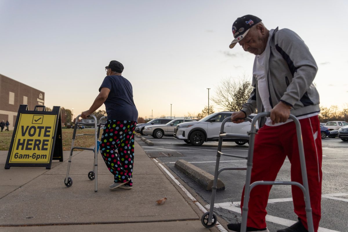 Bennett Gatewood, 76, and his sister, Patricia Tillman, 74, step out of their car and walk toward the Living Hope Baptist Church polling location on Election Day on Tuesday, Nov. 5, 2024. 