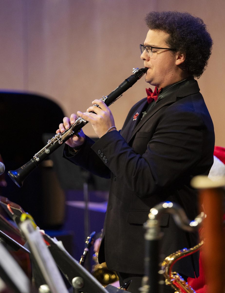 Soloist Nathanael Taylor plays the clarinet during the Holidays On The Hill concert  in Van Meter Hall on Friday, Nov. 22, 2024.