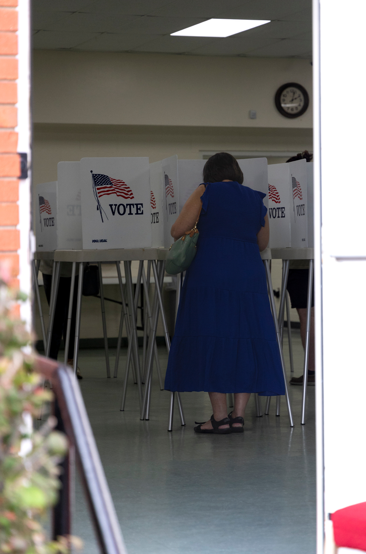 A voter casts their vote at State Street Baptist Church in Bowling Green on Election Day 2024.