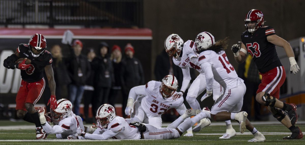 Western Kentucky running back Elijah Young (3) breaks a tackle during WKU’s game against Jacksonville State in L.T. Smith Stadium in on Saturday Nov. 30, 2024. WKU won 19-17.