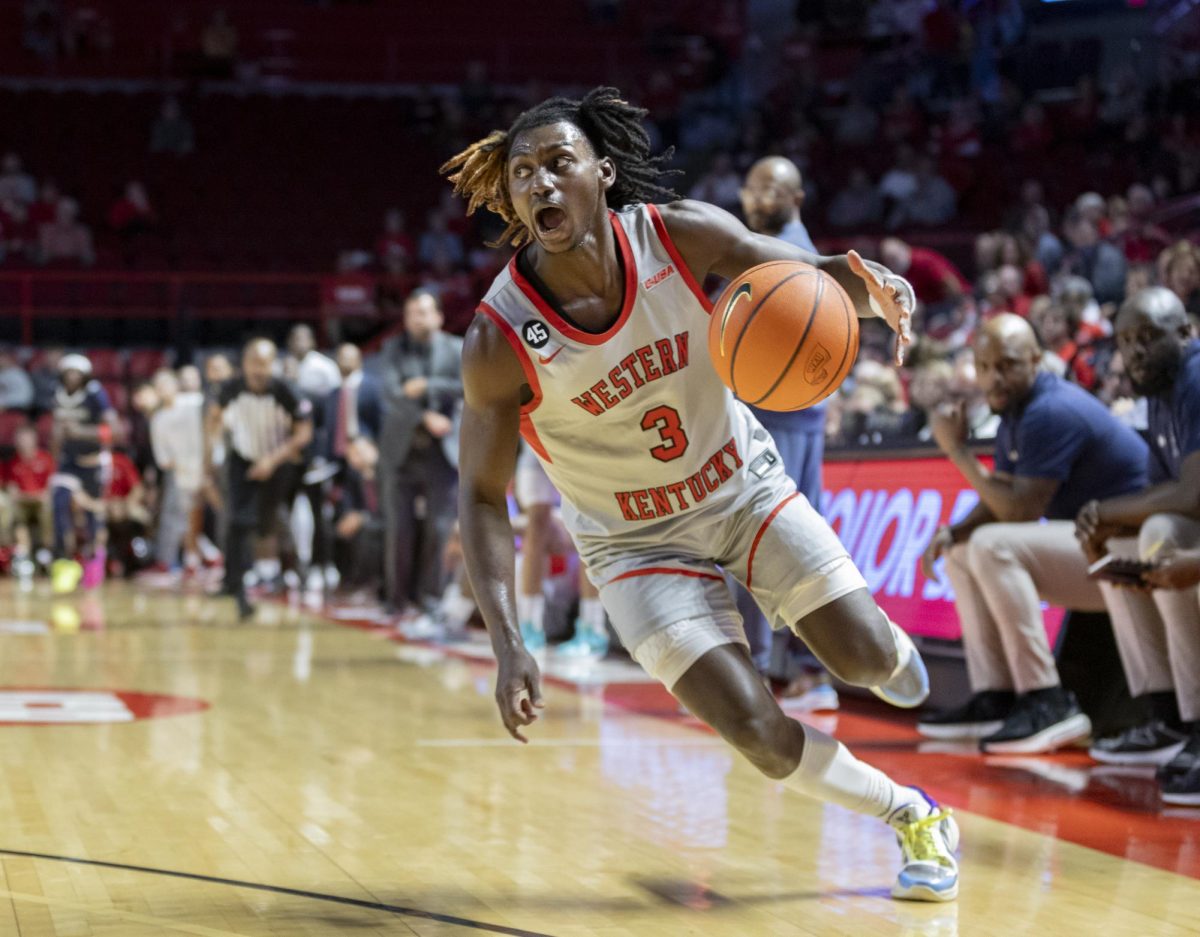 Guard Jalen Jackson (3) yells for his teammates while driving the ball to the basket during the match against Jackson State University on Nov. 20, 2024. The Hilltoppers won 79-62.