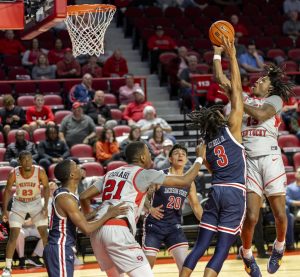 Guard Julius Thedford (13) reaches for a field goal during the match against Jackson State University at E.A. Diddle Arena on Nov. 20, 2024. The Hilltoppers won 79-62.