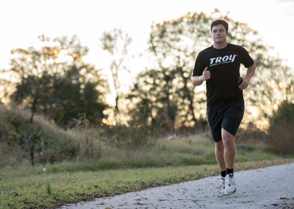 Sophomore and civil engineering major Max Lawrie comes down a stretch at the SGA’s Veteran’s Day 5K race at Kereiakes Park on Nov. 8, 2024. 