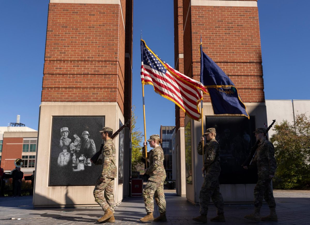 WKU ROTC marches around the Guthrie Tower as they present at the Veterans Day ceremony held by WKU ROTC at Guthrie Tower on Monday, Nov. 11, 2024.