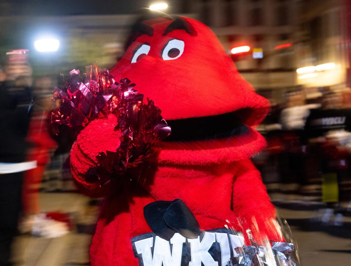 Big Red dances at the Big Red Roar celebration in Fountain Square Park after the WKU Homecoming Parade on Friday, Nov. 15, 2024. 