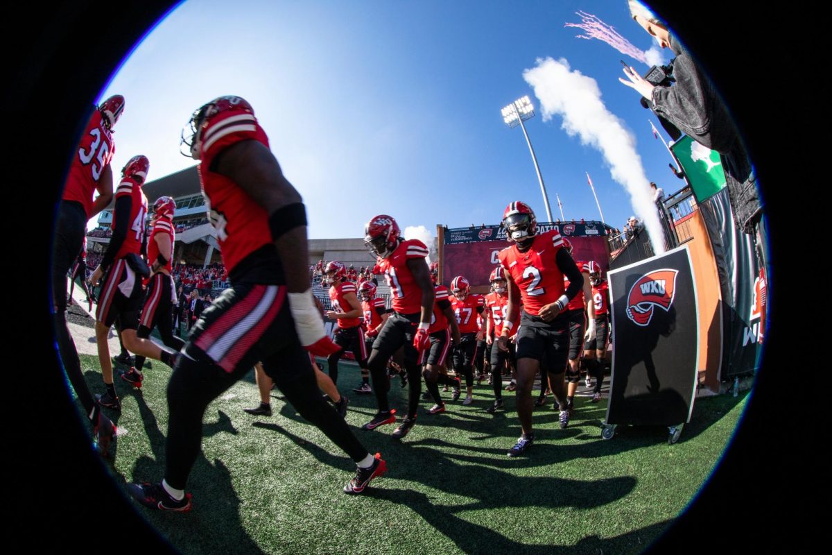 WKU’s football team takes the field during the WKU Homecoming game against Louisiana Tech University at L.T. Smith Stadium on Saturday, Nov. 16, 2024. 