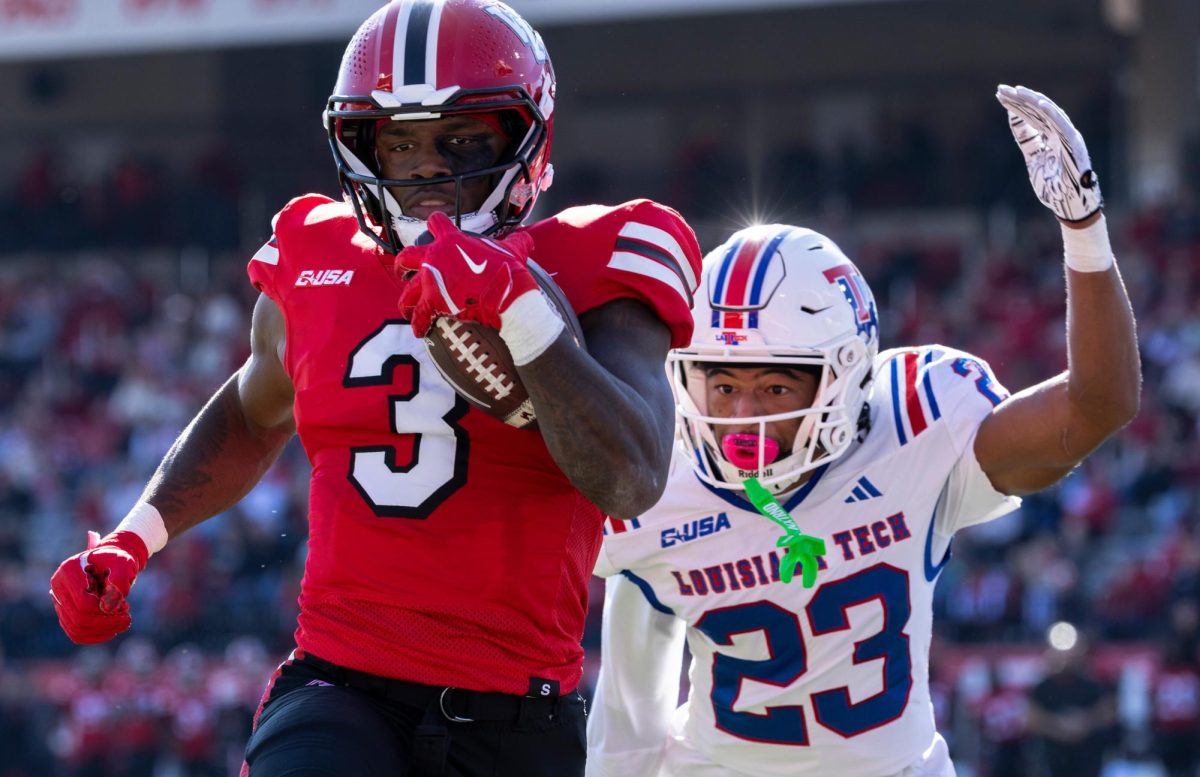 Western Kentucky Hilltoppers running back Elijah Young (3) runs into the end zone for a touchdown during the WKU Homecoming game against Louisiana Tech University at L.T. Smith Stadium on Saturday, Nov. 16, 2024. 