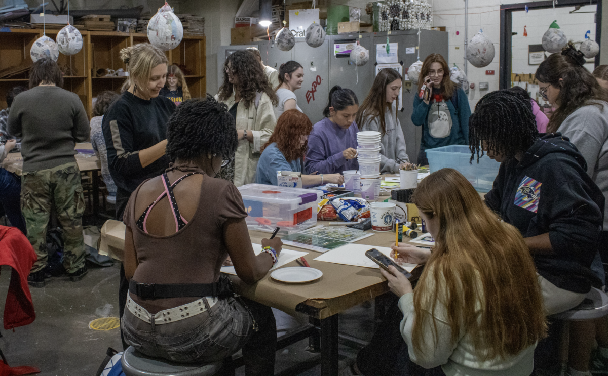 Students gather to participate in various arts and crafts activities at the Gender and Women's Studies Feminist Craft Night event on Nov 13.