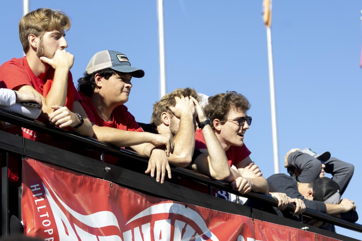 Western students react after the Hilltoppers lost possession in the 3rd quarter during the WKU Homecoming game against Louisiana Tech in L.T. Smith Stadium on Saturday, Nov. 16, 2024. 