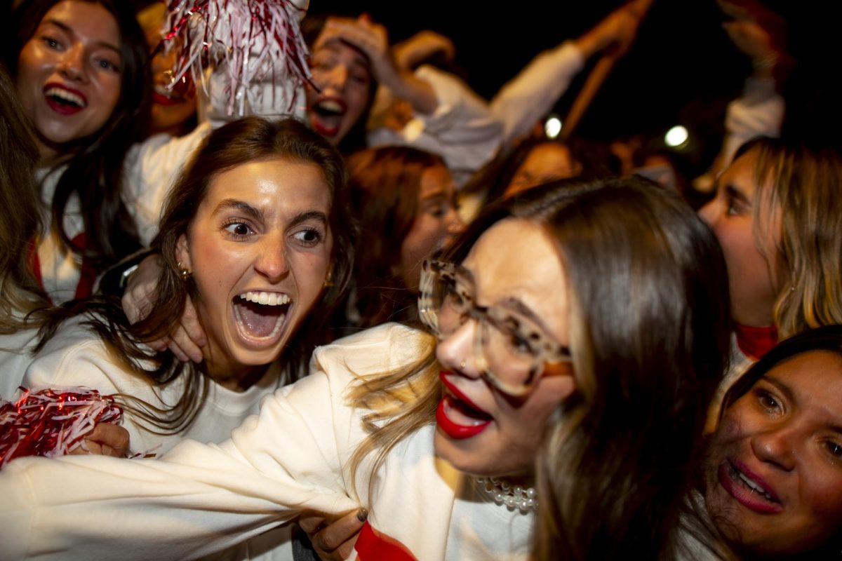 Overall homecoming chairs Maggie Blair (left) and Riley Jaggers (right) of Alpha Delta Pi celebrate winning first overall after the “Roaring Red” Homecoming Parade after WKU’s Big Red Roar on Friday, Nov. 15, 2024. 