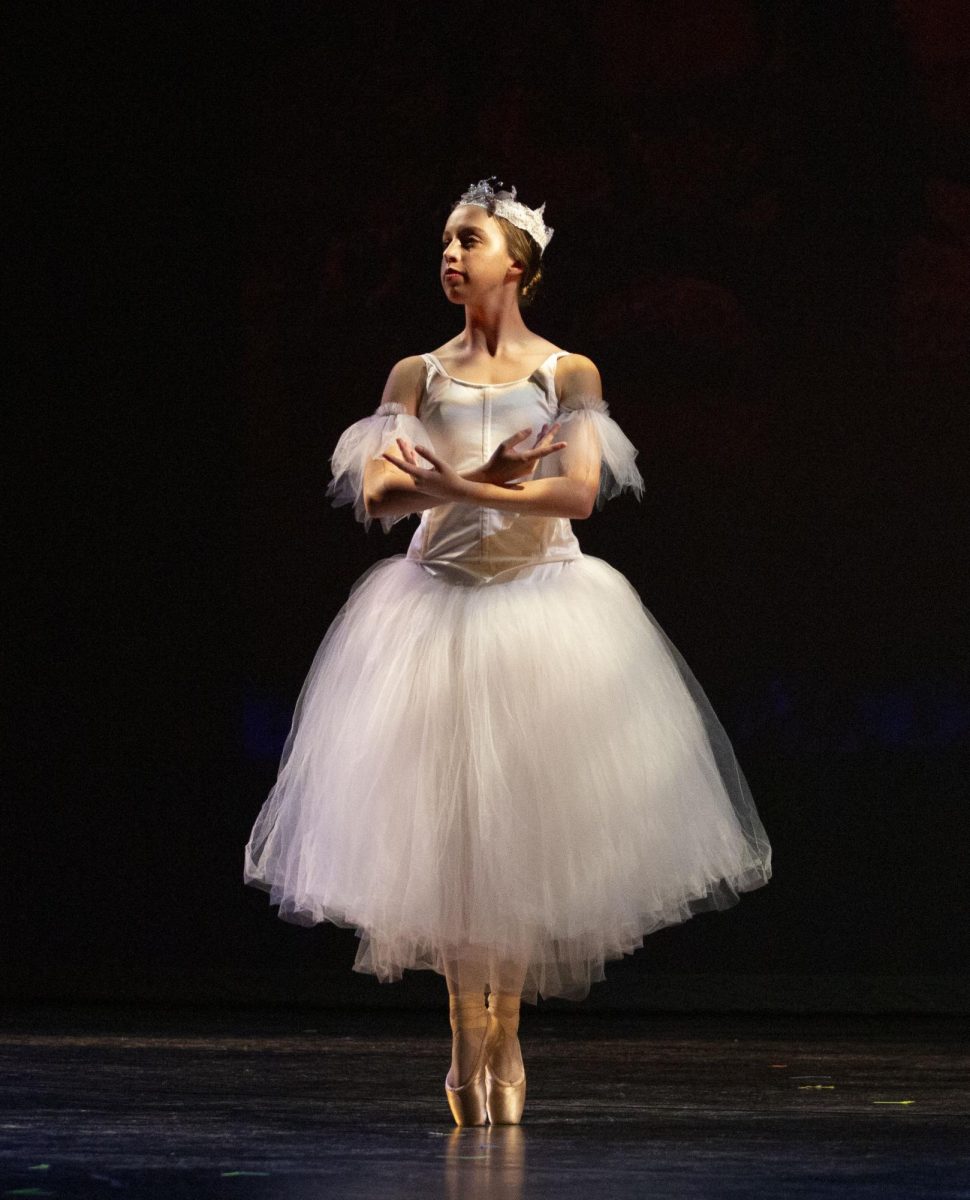 Lindy Fischer performs her solo ballet act during the 2024 WinterDance rehearsal at Van Meter Hall on Nov. 13, 2024.