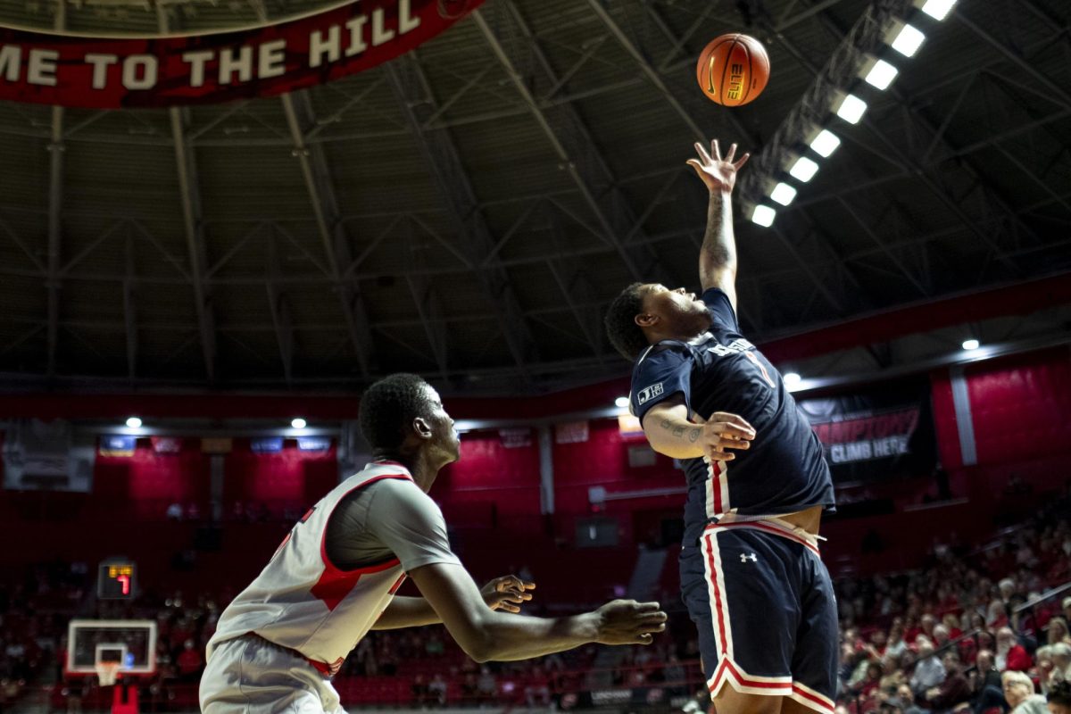 Jackson State center Shannon Grant (7) lunges for a baseline throw-in guarded by WKU forward Babacar Faye (5) during WKU’s game against the Jackson State Tigers on Wednesday, Nov. 20, 2024 in E.A. Diddle Arena. 