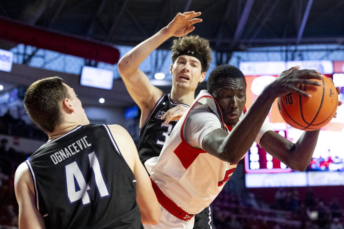 Senior forward Babacar Faye (5) is fouled hard on the way to the basket late in the second half during WKU’s win against Lipscomb on Sunday, Nov. 17, 2024 in E.A. Diddle Arena. Faye had 17 points and 9 rebounds to contribute to WKU’s win. 