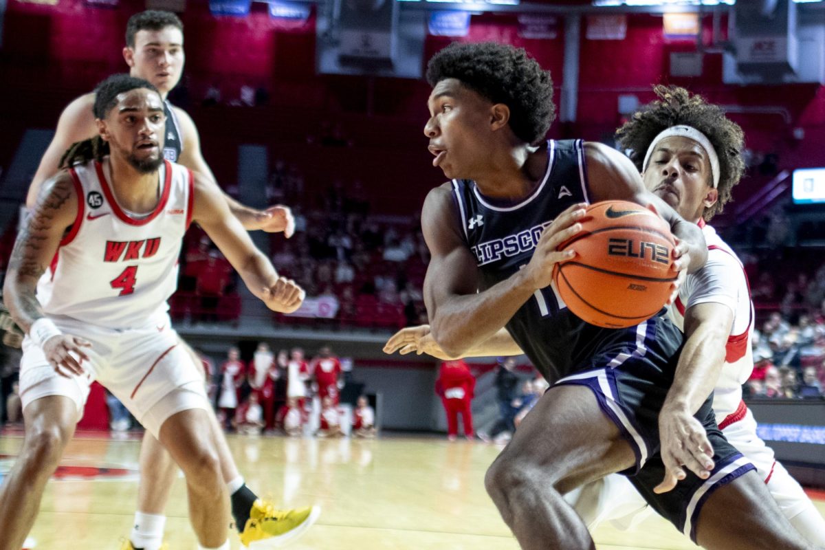 Western guard Braxton Bayless attempts to swipe the ball from Lipscomb’s Logan Suber on a baseline drive during WKU’s game against Lipscomb on Sunday, Nov. 17, 2024 in E.A. Diddle Arena. WKU trailed Lipscomb for the majority of the half but were able to shrink an eleven point deficit to 1 for a score of 30-31 at halftime. 