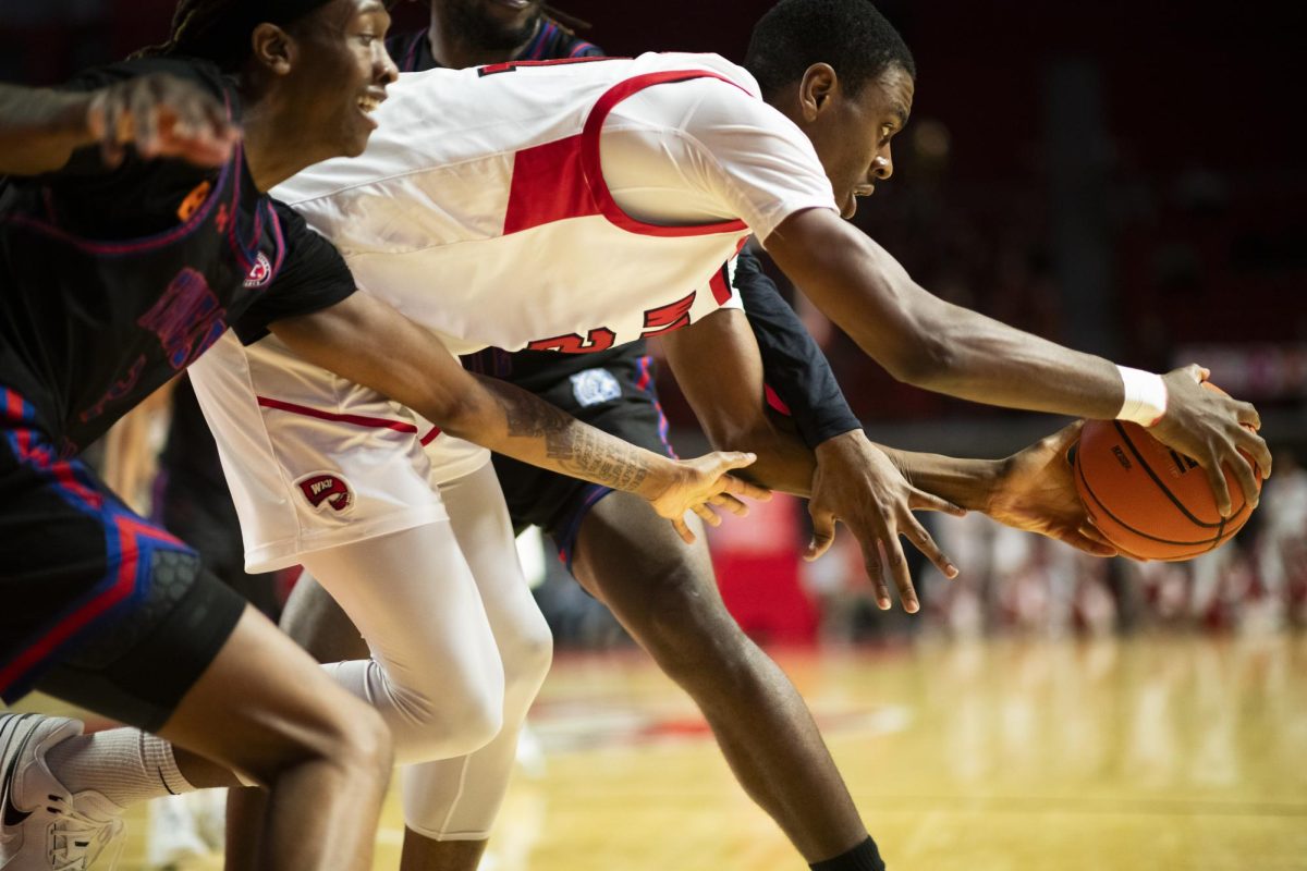 WKU forward Leeroy Odiahi (21) fights for the ball during the Hilltopper's game against Tennessee State University in Bowling Green, Ky. on Tuesday, Dec. 10, 2024.