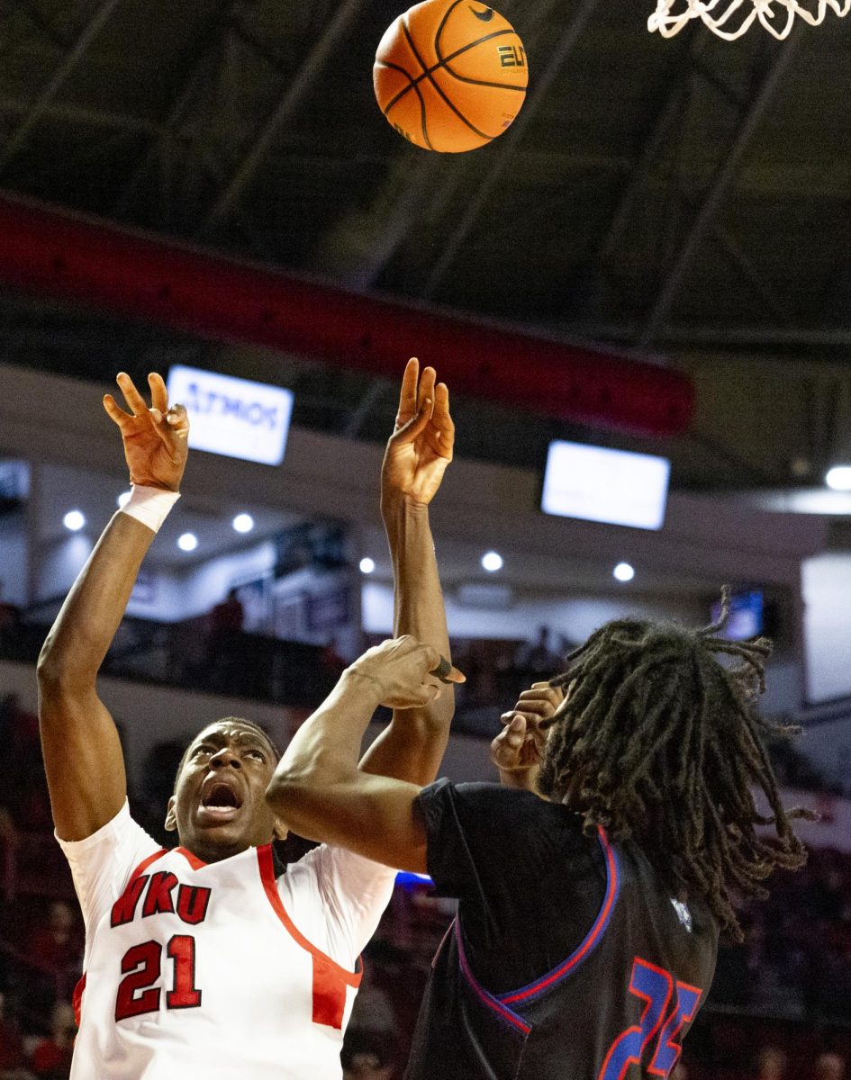 WKU forward Leeroy Odiahi (21) shoots the ball during the Hilltopper's game against Tennessee State University in Bowling Green, Ky. on Tuesday, Dec. 10, 2024.