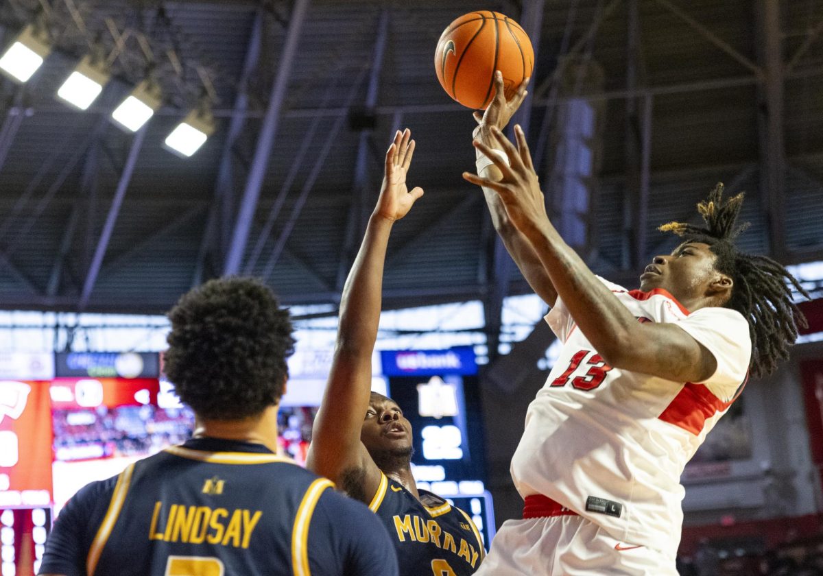 WKU guard Julius Thedford (13) shoots the ball during the Hilltopper's game against the Murray State Racers in Bowling Green, Ky. on Saturday, Dec. 14, 2024.