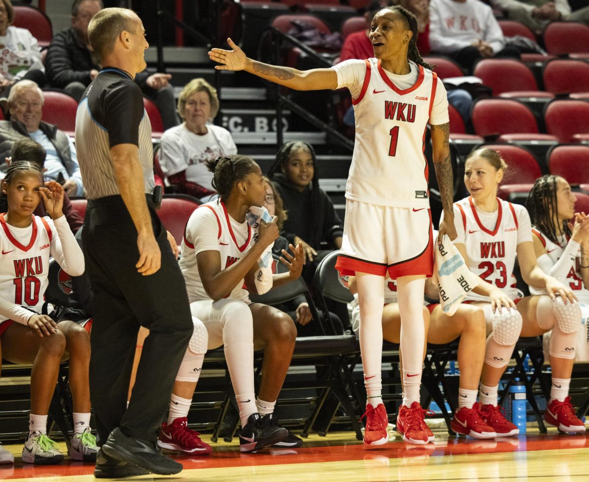 WKU guard Destiny Salary (1) talks to a referee during the Lady Topper's game against the Kentucky Wesleyan Panthers in Bowling Green, Ky. on Wednesday, Dec. 11, 2024.