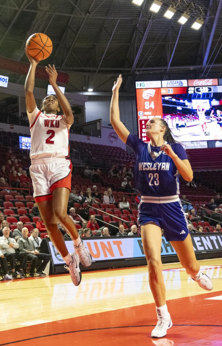 WKU guard Torri James (2) makes a layup during the Lady Topper's game against the Kentucky Wesleyan Panthers in Bowling Green, Ky. on Wednesday, Dec. 11, 2024.