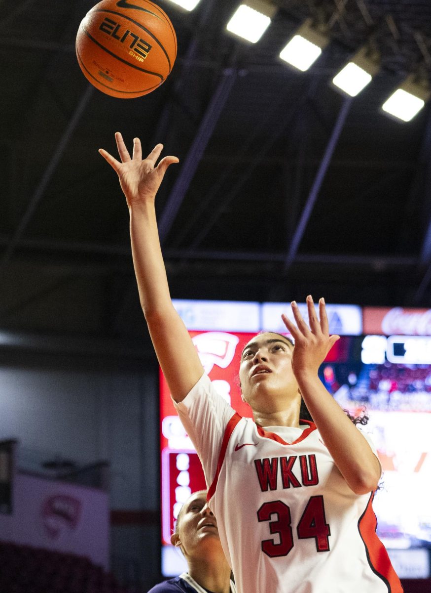 WKU guard Salma Khedr (34) makes a layup during the Lady Topper's game against the Kentucky Wesleyan Panthers in Bowling Green, Ky. on Wednesday, Dec. 11, 2024.