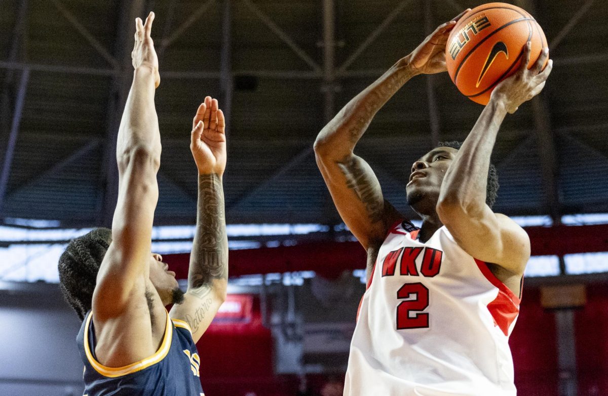 WKU guard Don McHenry (2) attempts a layup during the Hilltopper's game against the Murray State Racers in Bowling Green, Ky. on Saturday, Dec. 14, 2024.