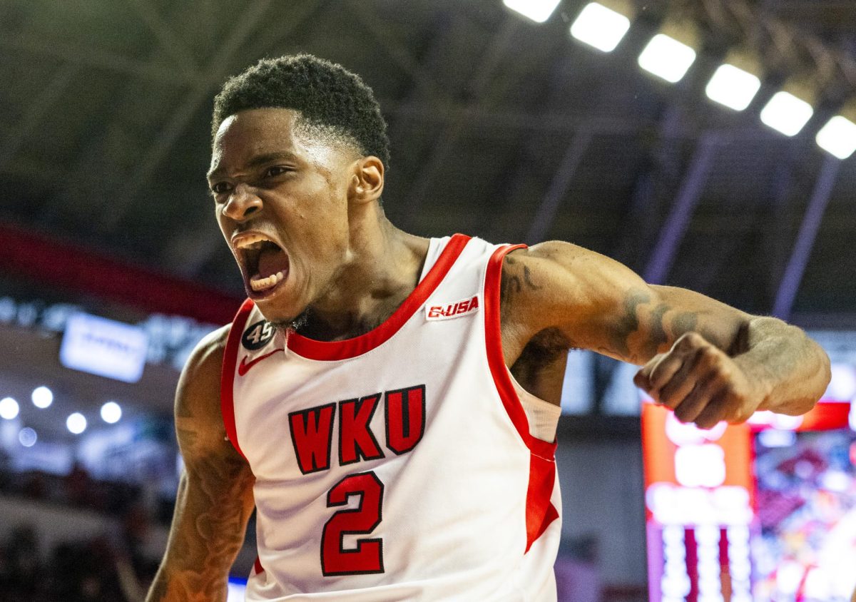 WKU guard Don McHenry (2) celebrates a point during the Hilltopper's game against the Murray State Racers in Bowling Green, Ky. on Saturday, Dec. 14, 2024.