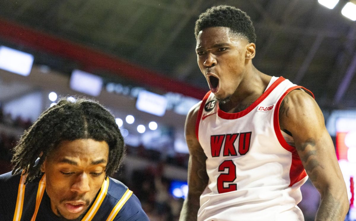 WKU guard Don McHenry (2) celebrates a point during the Hilltopper's game against the Murray State Racers in Bowling Green, Ky. on Saturday, Dec. 14, 2024.