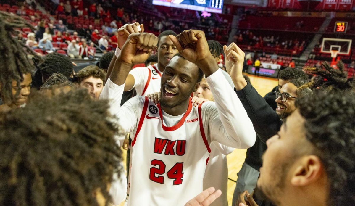 WKU forward Tyrone Marshall Jr. (24) encourages his team before the Hilltopper's game against the Seattle Redhawks in Bowling Green, Ky. on Tuesday, Dec. 17, 2024.