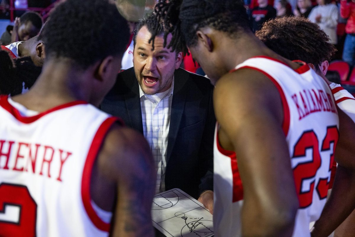 WKU head coach Hank Plona coaches his team before the Hilltopper's game against the Seattle Redhawks in Bowling Green, Ky. on Tuesday, Dec. 17, 2024.