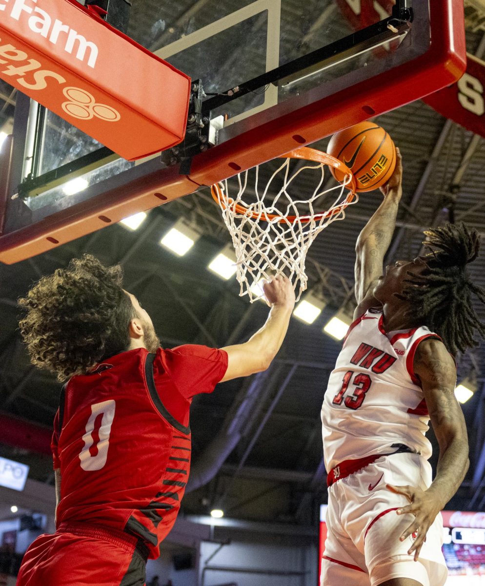 WKU guard Julius Thedford (13) dunks the ball during the Hilltopper's game against the Seattle Redhawks in Bowling Green, Ky. on Tuesday, Dec. 17, 2024.