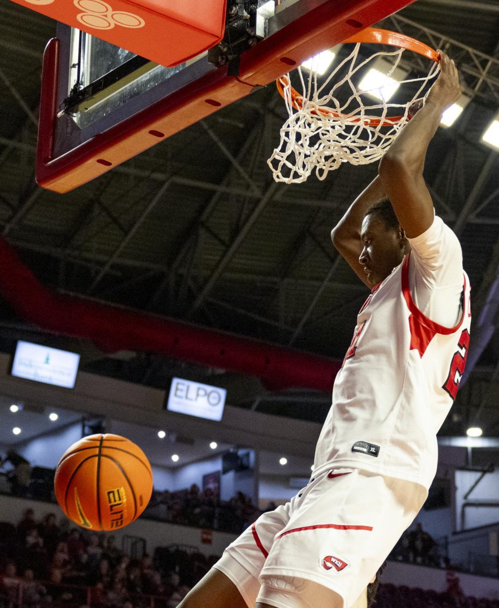 WKU forward Leeroy Odiahi (21) dunks the ball during the Hilltopper's game against the Seattle Redhawks in Bowling Green, Ky. on Tuesday, Dec. 17, 2024.