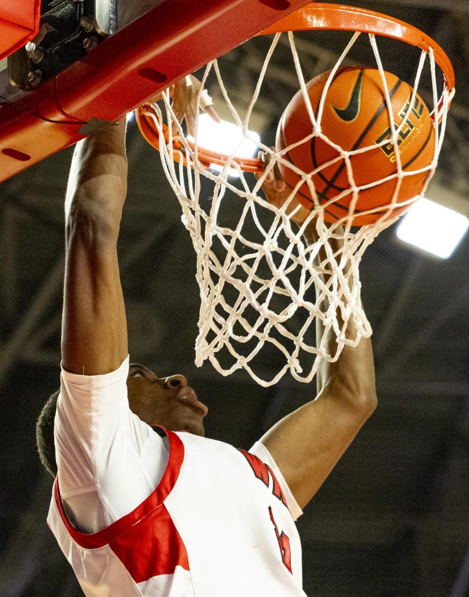 WKU forward Leeroy Odiahi (21) dunks the ball during the Hilltopper's game against the Seattle Redhawks in Bowling Green, Ky. on Tuesday, Dec. 17, 2024.