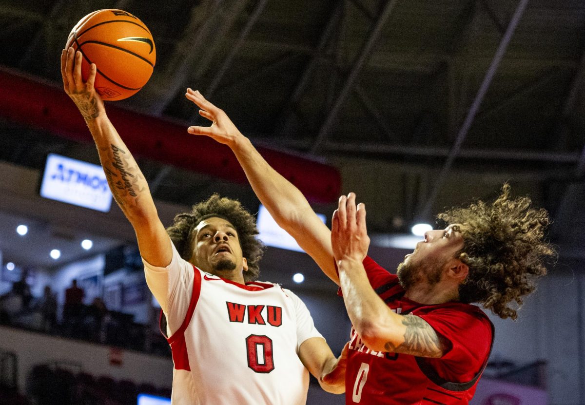 WKU guard Braxton Bayless (0) attempts a layup during the Hilltopper's game against the Seattle Redhawks in Bowling Green, Ky. on Tuesday, Dec. 17, 2024.