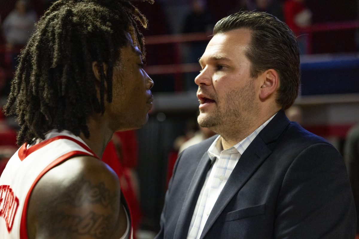 WKU head coach speaks to Guard Julius Thedford (13) after the Hilltopper's game against the Seattle Redhawks in Bowling Green, Ky. on Tuesday, Dec. 17, 2024.