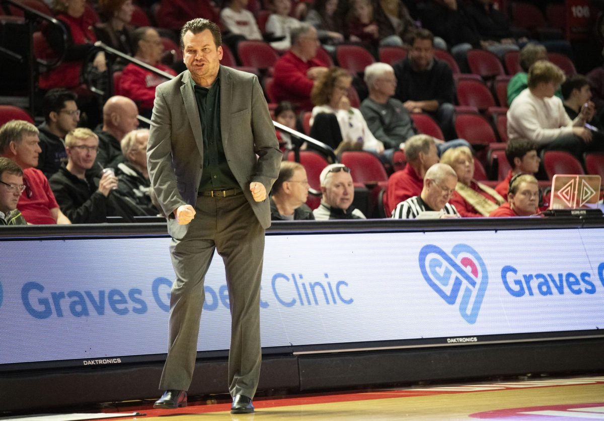 WKU head coach Hank Plona shouts during the Hilltopper's game against the Kentucky Wesleyan Panthers in Bowling Green, Ky. on Saturday, Dec. 21, 2024.