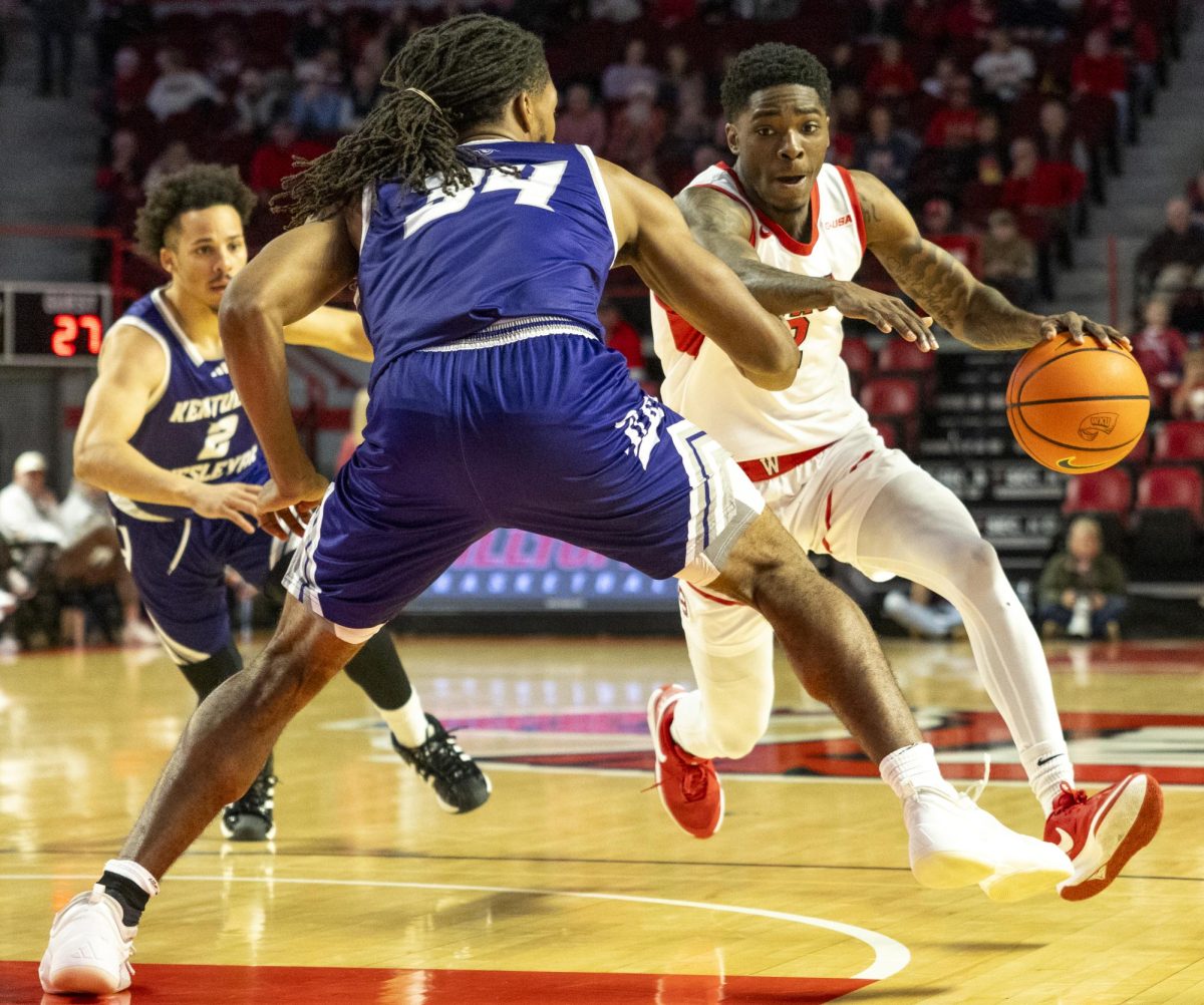 WKU guard Don McHenry (2) drives the lane during the Hilltopper's game against the Kentucky Wesleyan Panthers in Bowling Green, Ky. on Saturday, Dec. 21, 2024.