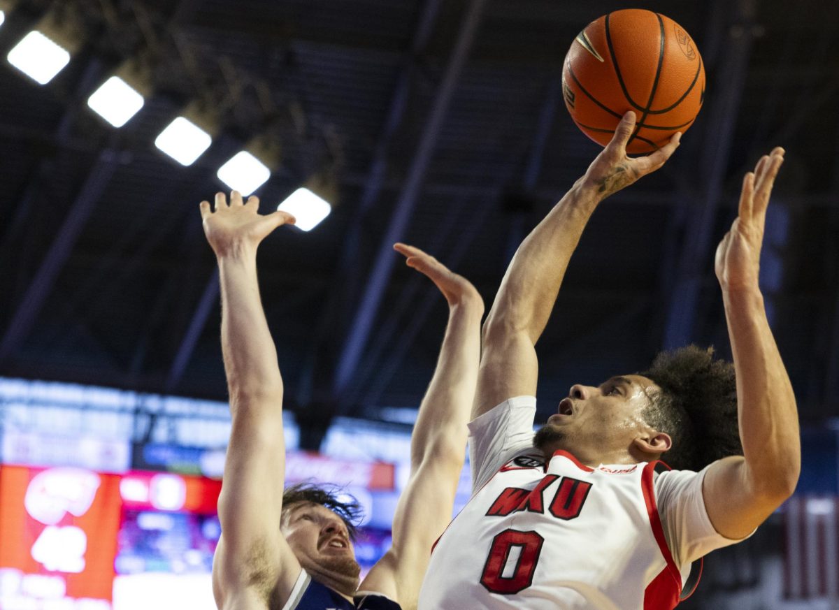 WKU guard Braxton Bayless (0) makes a basket during the Hilltopper's game against the Kentucky Wesleyan Panthers in Bowling Green, Ky. on Saturday, Dec. 21, 2024.