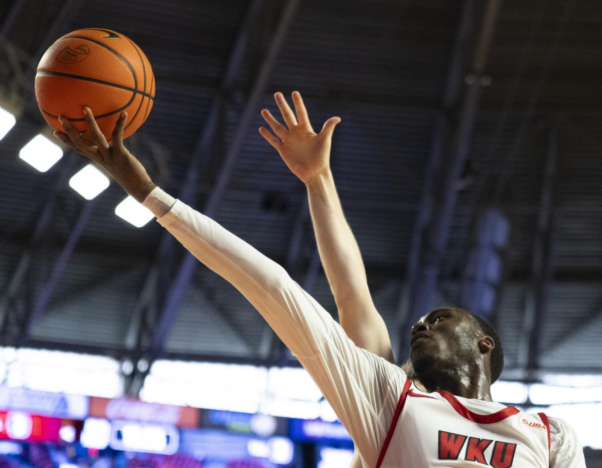 WKU forward Tyrone Marshall Jr. (24) attempts a layup during the Hilltopper's game against the Kentucky Wesleyan Panthers in Bowling Green, Ky. on Saturday, Dec. 21, 2024.