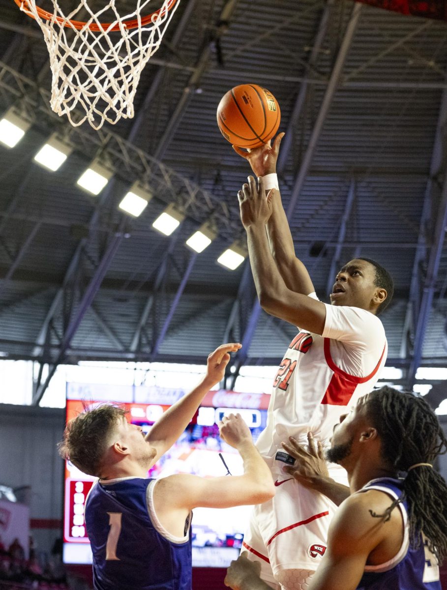 WKU forward Leeroy Odiahi (21) attempts a layup during the Hilltopper's game against the Kentucky Wesleyan Panthers in Bowling Green, Ky. on Saturday, Dec. 21, 2024.