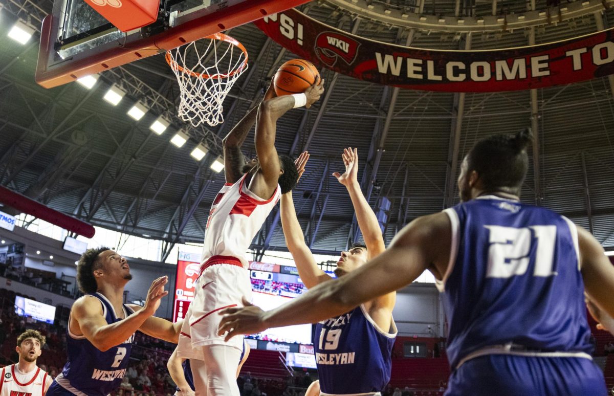 WKU guard Don McHenry (2) makes a layup during the Hilltopper's game against the Kentucky Wesleyan Panthers in Bowling Green, Ky. on Saturday, Dec. 21, 2024.