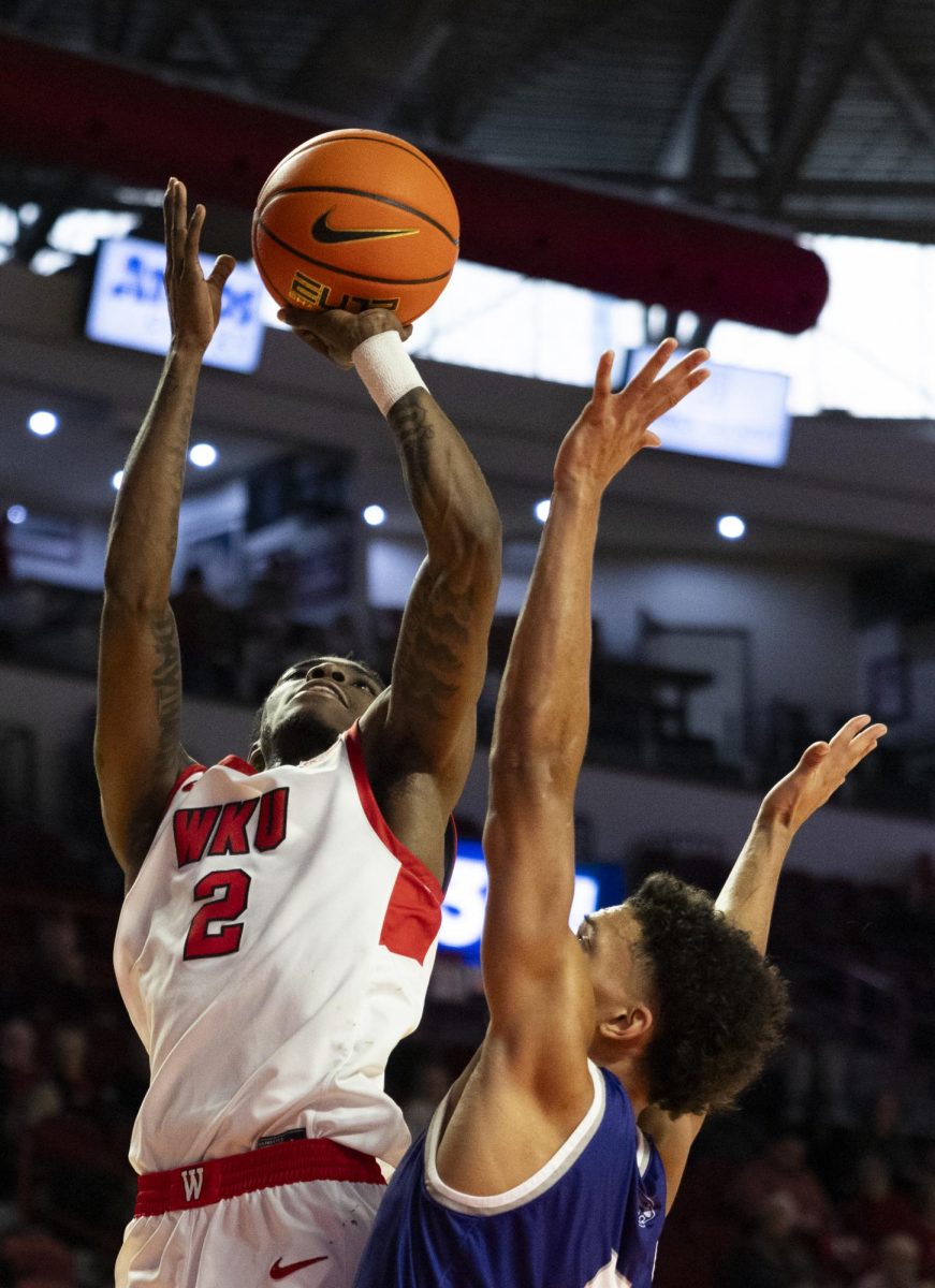 WKU guard Don McHenry (2) shoots the ball during the Hilltopper's game against the Kentucky Wesleyan Panthers in Bowling Green, Ky. on Saturday, Dec. 21, 2024.