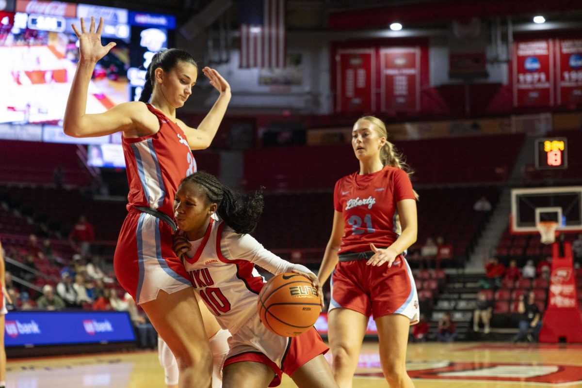 WKU guard Acacia Hayes (10) drives the ball to the net during the Lady Topper's game against the Liberty Flames in Bowling Green, Ky. on Thursday, Jan. 2, 2025.